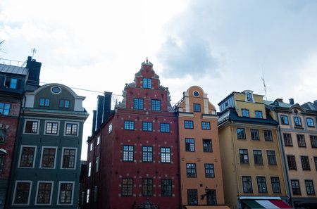 Sweden, traditional imposing colorful building at Grand Square, Stortorget the oldest public square in Stockholm Gamla Stan Old Town. Upper partの写真素材