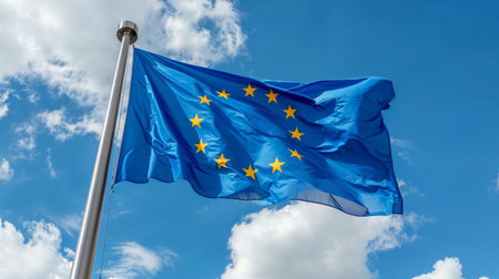 European union flag waving on blue sky, EU sign symbolの素材