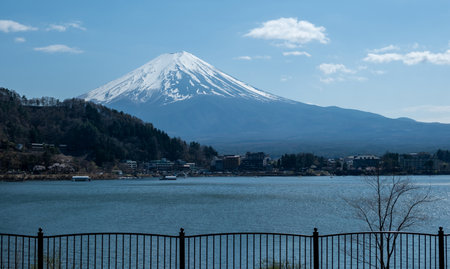Fuji Mountain snowcapped and Lake kawaguchiko Japan, blue sky and clouds in Spring