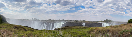 Victoria Falls, waterfall on the Zambezi River on the border between Zambia and Zimbabwe. Africaの写真素材