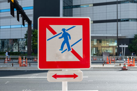 No jaywalking sign, Pedestrian crossing is not allowed. Road sign in Tokyo downtown, Japan.の写真素材