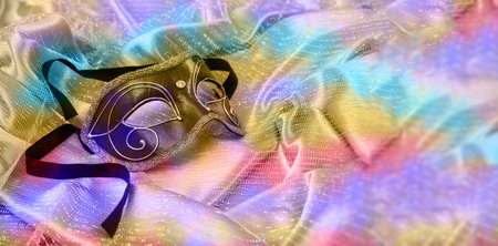 Carnival party. Venetian female mask, masquerade, mardi grass celebration, copy spaceの写真素材