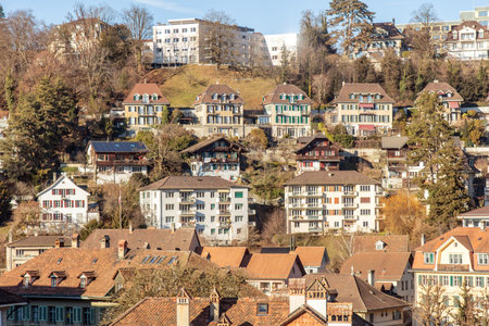 Switzerland, Bern cityscape, modern and traditional architecture buildings along the Aare river