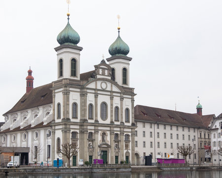 Switzerland, Lucerne. Jesuit Church,  Catholic Church in baroque style architecture, on the bank of Reuss River.の写真素材