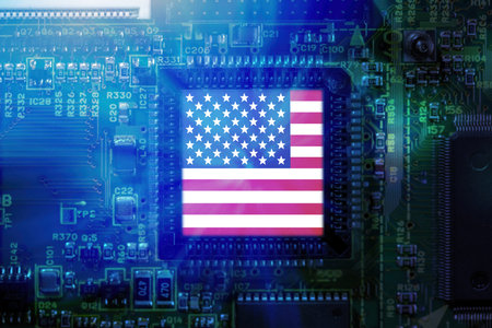 USA flag on a CPU processor. American GPU microchip on a motherboard. Chip manufacturerの写真素材