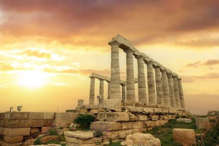 Cape Sounio, Poseidon temple archaeological site at sunset, Attica, Greece. Blue cloudy skyの写真素材