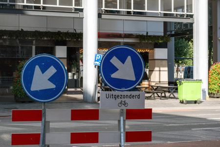 Street barricade and road detour sign, Rotterdam city centerの写真素材