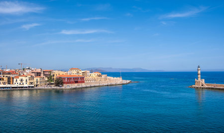 Crete, Chania old harbour. Lighthouse and Firkas Fortress, blue sky and calm seaの写真素材