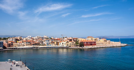 Crete, Chania old harbour. Lighthouse Nautical Museum and Firkas Fortress, blue sky and calm seaの写真素材