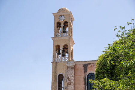 Crete island, Greece. Agios Nikolaos at Chania Old Town, Hunkar Mosque, now Orthodox Church, bell towerの写真素材