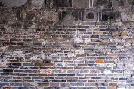 Old brick wall background, texture.Ttraditional grey brown bricks. Historical Chinese architecture