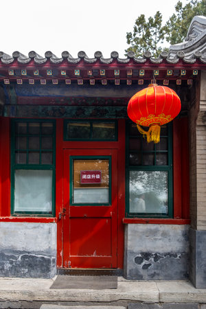 Red chinese lantern hanging from the roof. Traditional temple decorationの写真素材