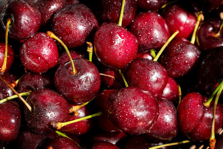 Ripe sweet cherries, summer berries background