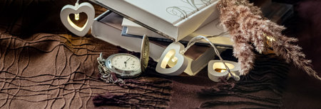 Vintage banner with pile of books and pocket watch