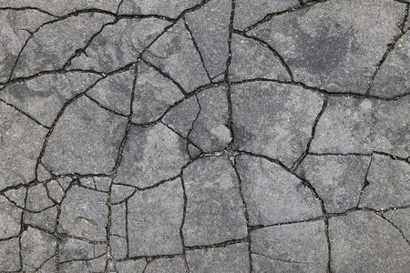 cracks on asphalt texture background