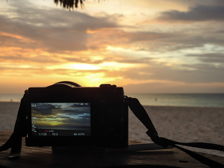 Tropical sunset filmed by a video camera in Aruba beach (Dutch Antilles).の写真素材