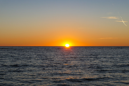 Sunset seascape during winter time at Ostia beach (Rome, Italy, Europe).の写真素材