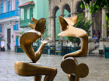Havana, Cuba: view of modern art statues under the rain (The Conversation Sculpture by Etienne).のeditorial素材