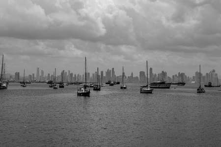 Panama City, 08.10.2019: view of boats anchored in the bay with the modern town in the background.