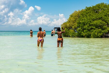 Isla de la Pasion (Holbox, Quintana Roo), Mexico: tourists walking around the little island in the Yum Balam nature reserve.の写真素材