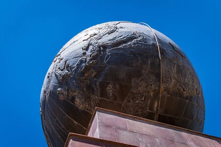 Quito, Ecuador: view of the globe statue in the Mitad del Mundo on the equator line.の写真素材