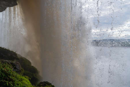 View of Waterfall Ax falling on the lagoon in Canaima National Park, Bolivar, Venezuela.の写真素材
