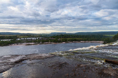 View of waterfalls falling on the lagoon in Canaima National Park, Bolivar, Venezuela.の写真素材