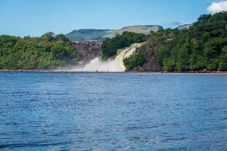 View of waterfalls falling on the lagoon in Canaima National Park, Bolivar, Venezuela.の写真素材