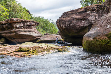 View of a big red stones along Churun river in Canaima National Park, Bolivar, Venezuela.の写真素材