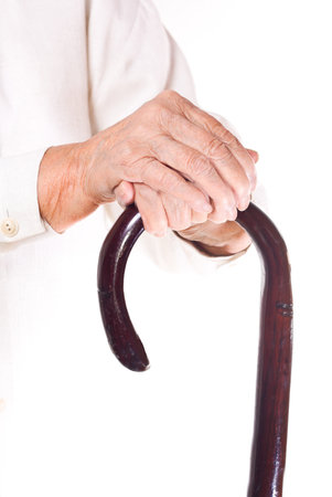 hand of an old man in white, with isolated backgroundの写真素材