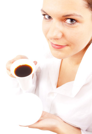 attractive woman in white shirt enjoying a  morning coffeeの写真素材
