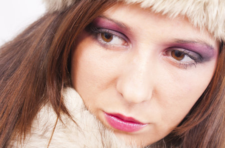 A portrait of an attractive woman wearing a fur hatの写真素材