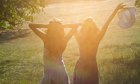 Two friends enjoying the sommer sunnの写真素材