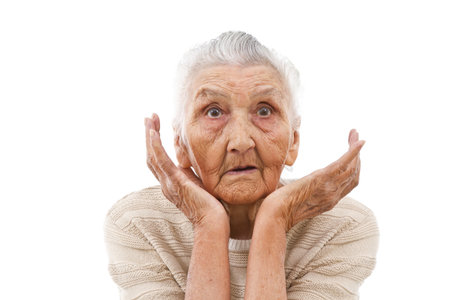 very old woman beng surprised by something の写真素材