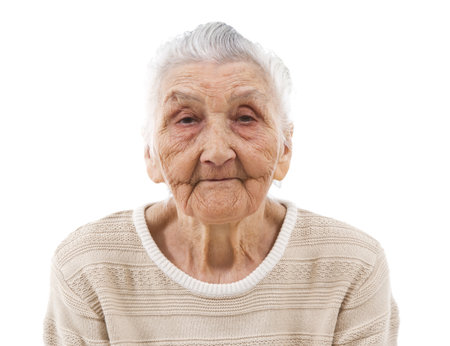 bored old woman isolated on whiteの写真素材
