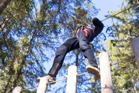young woman having fun in an outdoor adventure park