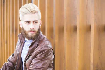 Fashionable young man representing the new generation's hipster style.の写真素材