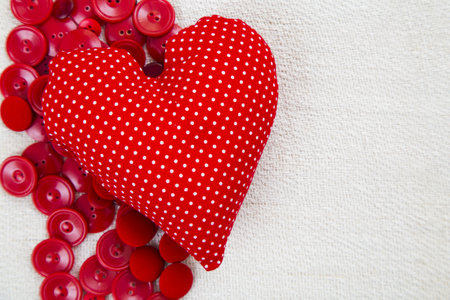 Red heart shaped pillow missing text in copy space.の写真素材