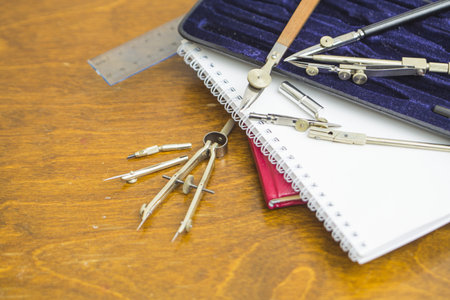Scale and many other architectural tools with notebook.