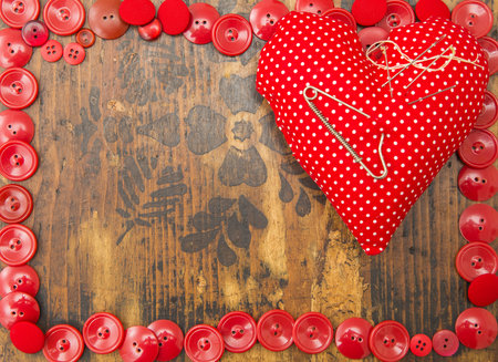 Red heart shaped pillow missing text in copy space.の写真素材