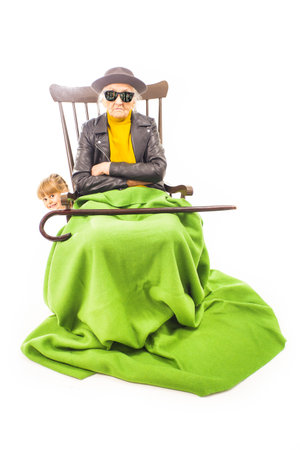 Cool old woman with sunglasses and hat.の写真素材
