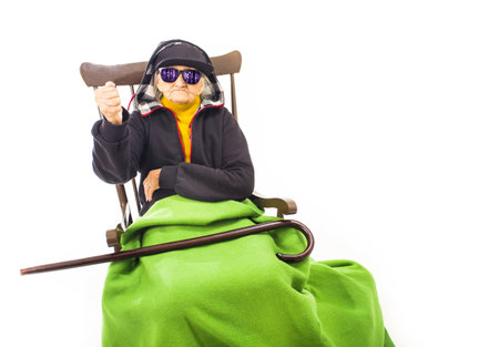 Cool old woman with sunglasses and hat.の写真素材
