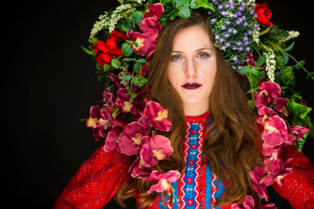 young fairy woman with flowers on her headの写真素材