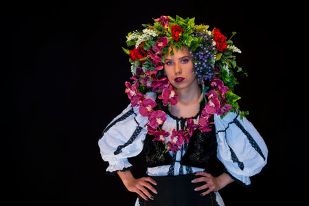 young fairy woman with flowers on her headの写真素材