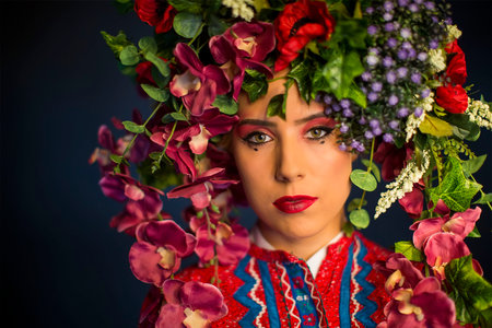young fairy woman with flowers on her headの写真素材