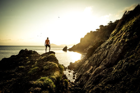 Man running near the seaの写真素材