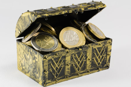 treasure chest filled with gold and silver coin, euro currencyの写真素材