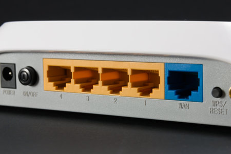 port on the back of the router, network port on black backgroundの写真素材