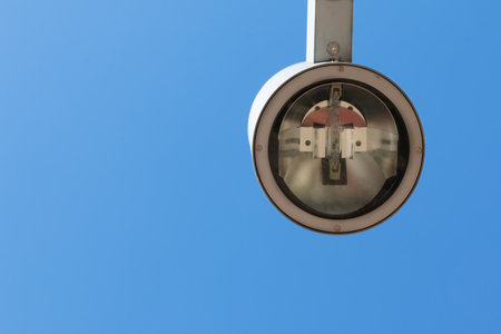 modern street lamp with blue sky in background, public lighting bottom viewの写真素材