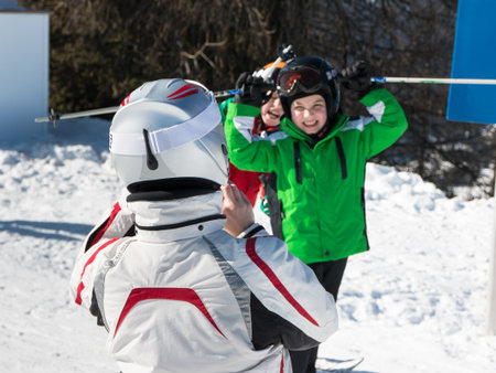 taking children photo during holiday in alps mountainsの写真素材